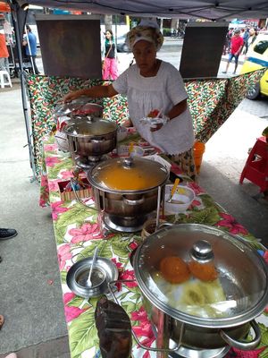 Bean+onion ball fried in dende oil(close to the camera), vatapa, caruru and pepper sauces. Shrimp not visible. at Acarajé da BaiAnna in Rio De Janeiro