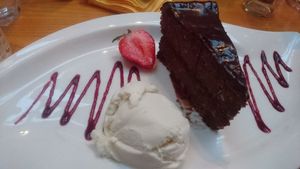 Vegan chocolate cake and ice cream at Garrison West in Fort William