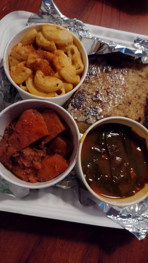 Mac & cheese, yams, collard greens & cornbread at Trio Plant-Based in Minneapolis