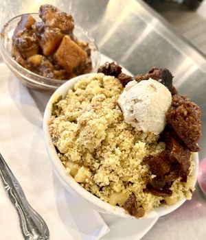 Soul food platter with riblets and side of yams   at Trio Plant-Based in Minneapolis