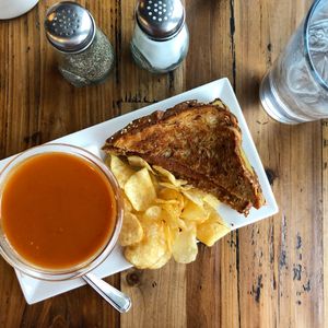Ham and cheese sandwich with tomato soup! at Trio Plant-Based in Minneapolis