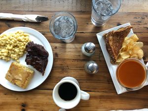 Ham and cheese with tomato soup and he soul food platter! at Trio Plant-Based in Minneapolis