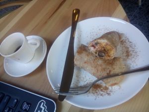 Espresso, buckwheat pancakes with cashew cream and fruit at Irmale's Cafe in Tbilisi