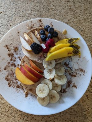 Pancakes with fruits at Leaves Cafe in Cotovia