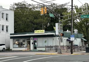 Parking in front; picnic tables on the rightt  at Luna Verde Vegan Mexican Restaurant in Bradley Beach