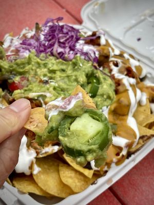 Huge portion of delicious nachos   at Luna Verde Vegan Mexican Restaurant in Bradley Beach