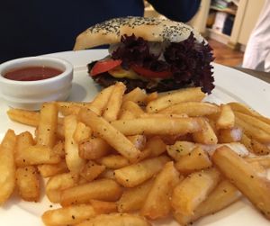 Seed burger (vegan version) & fries at The Lotus-Heart Restaurant in Christchurch