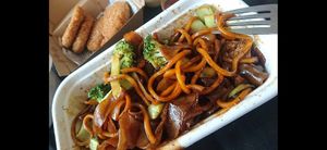 Char quay tow with nuggets in the back at The Origin Tales in Brunswick East