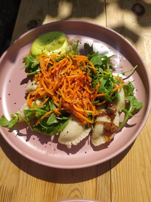 Pierogi with spinach and tofu filling with onion-tofu topping at Bistro Jaglana in Szczecin