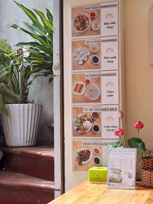 Menu wall at Com Pho Chay Tu Bi in Hanoi