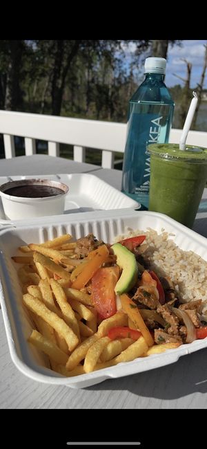 Lomo Saltado with a side of Beans and Green Machine Smoothie  at Norma's Plant Based Cuisine in Altamonte Springs