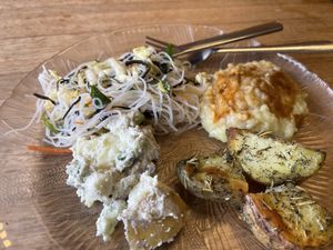 Potato salad,  noodle salad, shepherds pie and roasted potatoes   at Green Cuisine Vegetarian Restaurant in Victoria