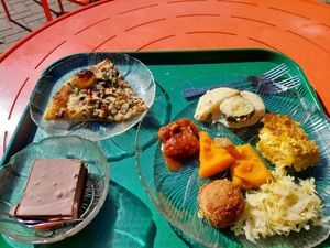 Sugar free cake, mushroom pizza, squash, cauliflower, potato gratin, falafel,  sauerkraut at Green Cuisine Vegetarian Restaurant in Victoria