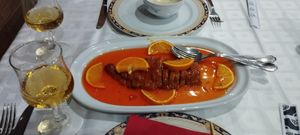 Mock chicken in orange sauce. With a glass Tsing Tao at Gran Mundo in Torremolinos