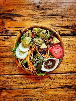 Creamy Hass avocados in pumpkin and sunflower seeds.  at Bean Me Up in Goa