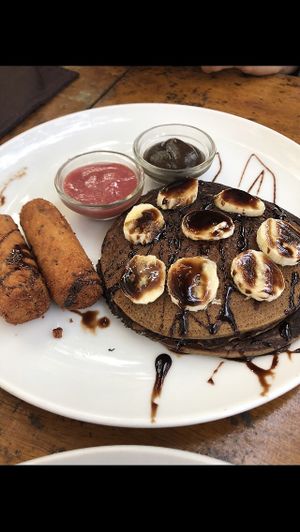 Chocolate banana pancakes with tofu sausage.  Yummmm!   at Bean Me Up in Goa