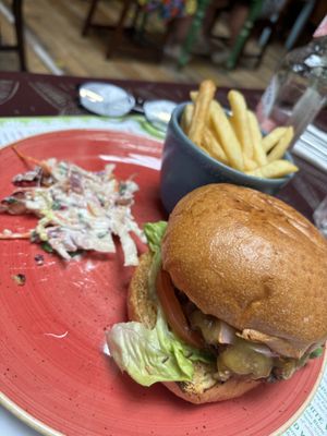 Beyond burger with fries and coleslaw   at Racconto Lounge  in Bury