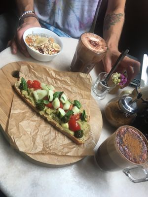 Vegan avocado-toast, chia pudding with fruit and granola, soy hot chocolate and soy cappuccino 🌱 at Louvre Michaelense in Sao Miguel