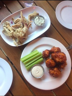 Eve Olive Kalamari + Cauliflower Wings - $12 each at Eve Olive in Nanaimo
