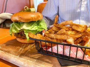Very Good Butchers' Burger with cajun potato fries. at Eve Olive in Nanaimo