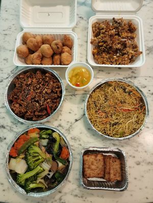 Lotus Pond Vegan Feast: Pineapple Soya Balls 37, Oyster Mushroom 24, Ginger Beef 22, Singapore Noodle 69, Buddha Feast 65, Turnip Cake 3 (all delicious!) at Lotus Pond in Victoria