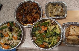 Buddha's Feast Chow Mein, Chili Eggplant Szechuan Style, Fresh Bean Curd Skin Rolls and Shiitake Mushroom with Mixed Greens, Crispy Pancakes, Turnip Cakes at Lotus Pond in Victoria