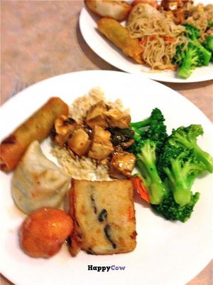 From the buffet, front: Broccoli in ginger sauce, turnip cake, sweet and sour soya ball, pot sticker, brown rice and braised tofu; rear: fried vermicelli  at Lotus Pond in Victoria