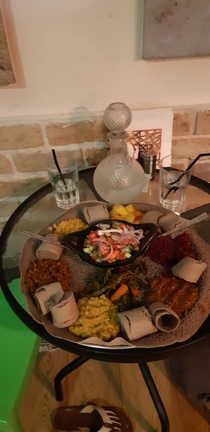 Injera for a couple - 8 different stews and a large salad at Gojo in Rehovot