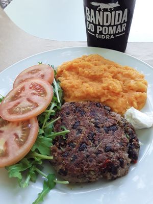 Vegan plate: bean burger, carrot puree and salad at Café Academico in Coimbra