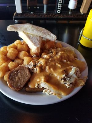 Portland Scramble, they were out of breakfast potatoes so I subbed tots at Hungry Tiger in Portland