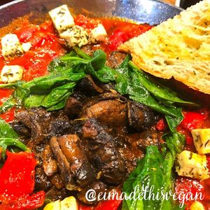 Shakshouka with mushrooms and vegan cheese at Zenith in Lisbon