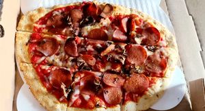 Vegan cheese, vegan pepperoni, mushrooms at Azzip Pizza in Bloomington