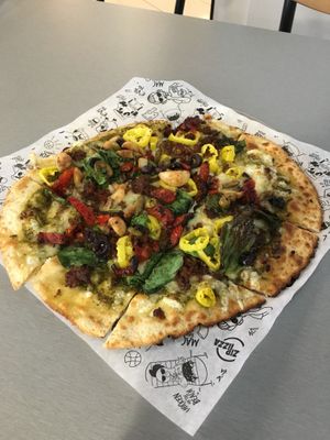 Loaded pizza with vegan cheese and zero sausage at Azzip Pizza in Bloomington