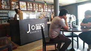 Desk. Hummus veggie plate available at Joma Bakery Cafe - That Luang in Vientiane