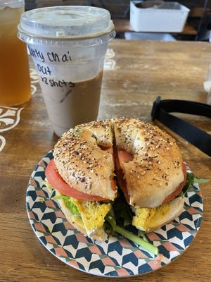 Double dirty chai w oat milk and the vegan breakfast sam on an everything bagel   at Shanahan's Coffee House in Mukwonago