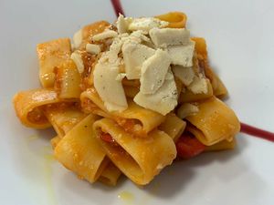 Calamarata (fresh pasta with pomodoro sauce and vegan cheese) at Alice e Viola in Collegno
