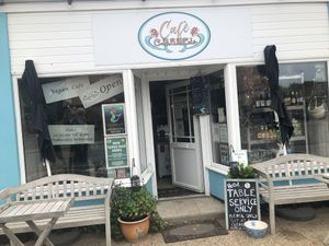 The exterior.  Seating inside and outside to the side   at Cafe Carmel in Bacton