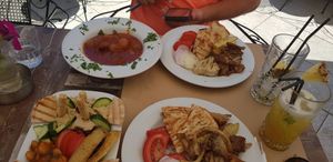 Gyros, stif5aso and greek platter at Aubergine Cafe in Corfu
