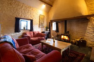 Unwind by the fire at Robins Realm in Carmarthen