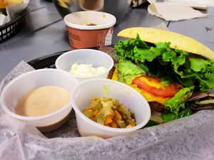 the garden patty on gluten free bun with sides of mayo, meta special sauce and giardiniera. i preferred this veggie patty to meta patty.  — at Meta Burger. at Meta Burger in Denver