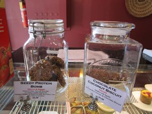 Seedy protein bombs and chocolate coconut biscuits at Himalaya Bakery and Cafe in Daylesford
