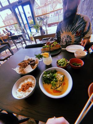 Fried oyster mushrooms, tofu yellow curry, banh mi, edemame, home made lemonade   at Omni Cafe in Whitley Bay