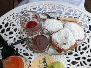 Beignets with a berry sauce and a chocolate sauce. at Fog Eater Cafe in Mendocino