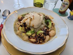 Gigante beans and hominy with mushroom cream and braised Brussels sprouts. at Fog Eater Cafe in Mendocino