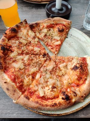 Pizza built from the toppings list (vegan ham, vegan cheese & pineapple) at Systrakaffi in Kirkjubaejarklaustur