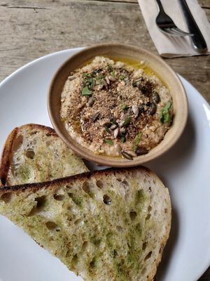 Dukkah-topped hummus with garlic sourdough at The Warren in Carmarthen