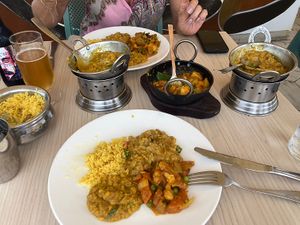 Lemon rice, dahl, mixed veggies, and aubergine dishes - all perfectly spiced and creamy!!  at Crown of India in Altea