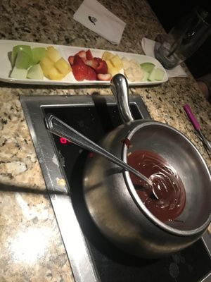 Vegan dark chocolate fondue with fruit at The Melting Pot in White Plains
