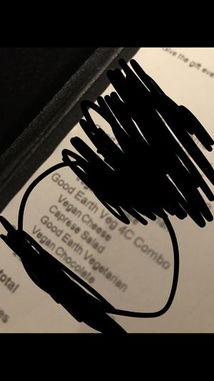 Receipt that says vegan cheese and vegan chocolate at The Melting Pot in White Plains