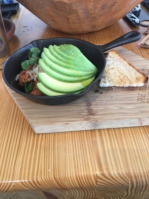 Mexican Breakfast Bowl made vegan added vegan cheese.  at The Butcher's Daughter in Brooklyn